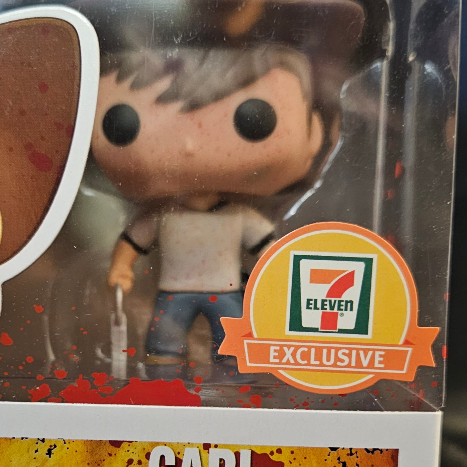 The Walking Dead Pop! Vinyl Figure Blood Splattered Carl [7-Eleven Exclusive] [97] - Fugitive Toys